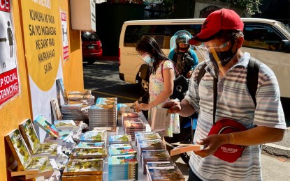<p><strong>FOOD FOR THE SOUL.</strong> Our Daily Bread Pilipinas along P. Guevarra Street in San Juan City offers religious books for free in this undated photo. The community book pantry, according to the Facebook post, aims to provide spiritual strength amid the Covid-19 pandemic.<em> (Photo courtesy of Our Daily Bread Pilipinas Facebook)</em></p>