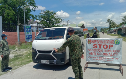 <p><strong>CHECKPOINT INSPECTION.</strong> Police personnel of the Shariff Saydona Mustapha municipality conduct checkpoints along the national highway linking Shariff Aguak, Shariff Saydona Mustapha, and Mamasapano following the arrest on Sunday (May 2, 2021) of three men for an attempt to smuggle 6,000 rounds of M16 bullets allegedly intended for BIFF terrorists in Maguindanao. Additional checkpoints were set up along the so-called SPMS box -- referring to the adjoining towns of Shariff Aguak, Pagatin (Datu Saudi Ampatuan town), Mamasapano, and Shariff Saydona, all in Maguindanao. <em>(Photo courtesy of Shariff Saydona MPS)</em></p>