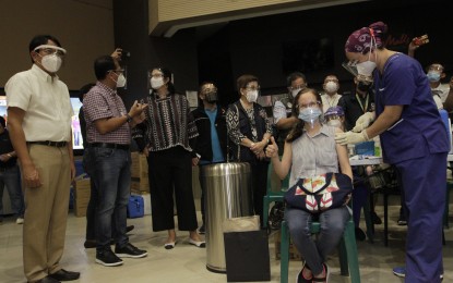 <p><strong>PILOT ROLLOUT.</strong> The Russian-made Sputnik V vaccines are rolled out for healthcare workers on Tuesday (May 4, 2021) at Ayala Malls Manila Bay. Mayor Edwin Olivarez and vaccine czar Secretary Carlito Galvez (1st and 2nd from left) witnessed the activity. <em>(PNA photo by Avito C. Dalan)</em></p>