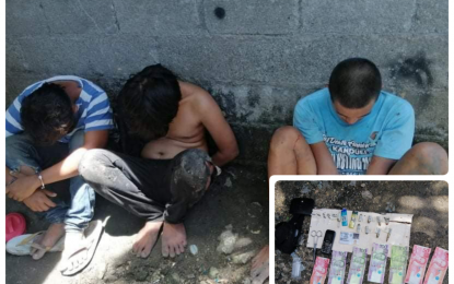 <p><strong>ARRESTED.</strong> The three drug suspects in handcuffs following their arrest on Monday (May 3, 2021) in a police drug buy-bust operation in Barangay Semba, Datu Odin Sinsuat, Maguindanao. Seized from the suspects were shabu items worth PHP20,000, several firearm ammunition, and drug paraphernalia. <em>(Photo courtesy of DXMY–Cotabato)</em></p>