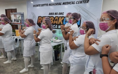 <p><strong>EARLY NURSING EXAM</strong>. Nurses from the Vicente Sotto Memorial Medical Center are seen posing for a photo opportunity during the vaccination rollout for medical front-liners in March this year in Cebu City. On Wednesday (May 5, 2021), Senator Christopher Lawrence “Bong” Go lauded the Professional Regulations Commission's (PRC) decision to move the nursing licensure examination to an earlier date to give fresh graduates who will pass the test a chance to augment healthcare professionals combating Covid-19.<em> (PNA photo by John Rey Saavedra)</em></p>