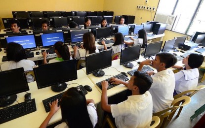 <p><strong>NEW NORMAL.</strong> Face-to-face classes, like in this undated photo of the Department of Information and Communications Technology, will have to wait until the Covid-19 crisis is over. For now, local governments try to provide free gadgets and Internet connection to their public school students. <em>(Photo courtesy of DICT)</em></p>