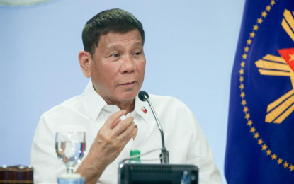 <p><strong>WHOSE PERMISSION.</strong> President Rodrigo Roa Duterte talks to the people after holding a meeting with the Inter-Agency Task Force on the Emerging Infectious Diseases (IATF-EID) core members at the Malago Clubhouse in Malacañang Park, Manila on Wednesday night (May 5, 2021). Duterte expressed his intent to launch a probe into the Philippines’ withdrawal of its ships in the West Philippine Sea amid the 2012 standoff with China. <em>(Presidential photo by Simeon Celi)</em></p>