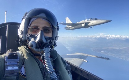 <p><strong>BOOSTING AIR DEFENSE.</strong> Defense Secretary Delfin Lorenzana takes a selfie while aboard an FA-50PH fighter aircraft during the Sanay Datu Air Defense Exercise in Basa Air Base, Floridablanca, Pampanga on Thursday (May 6, 2021). He said the defense department is pushing for the acquisition of multi-role fighter aircraft to boost the country's capability to defend its airspace.<em> (Photo courtesy of DND)</em></p>