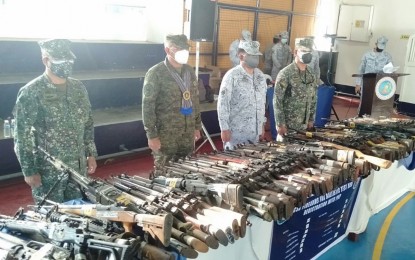 <p><strong>DESTRUCTION.</strong> Lt. Gen. Corleto Vinluan Jr., commander of the Western Mindanao Command (2nd from left), witnesses the destruction Friday (May 7, 2021) of 219 assorted firearms by the Naval Forces Western Mindanao headed by Rear Adm. Toribio Adaci Jr. (2nd from right). The majority of the firearms were seized by the Navy operating units during military operations against terrorists and lawless groups in Central Mindanao, Sulu, and Tawi-Tawi. <em>(Photo courtesy of the Naval Forces Western Mindanao Public Affairs Office)</em></p>