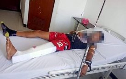 <p><strong>MURDER RAPS FILED.</strong> Police filed Thursday (May 6, 2021) murder raps against four suspects in the shooting-to-death of a village chief in Dauin, Negros Oriental. One of the suspects, the alleged gunman (shown in photo), is recuperating at a hospital in Dumaguete City, after he shot himself during a scuffle with the barangay secretary. <em>(Photo courtesy of Dauin PNP station)</em></p>