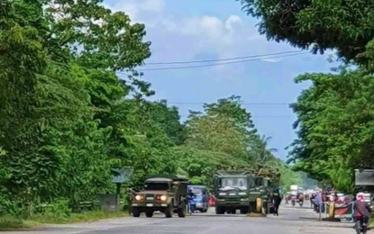 <p><strong>RETAKEN.</strong> Soldiers on board military trucks arrive in Datu Paglas, Maguindanao, after the Bangsamoro Islamic Freedom Fighters seized the town public market on Saturday (May 8, 2021) morning. Gunmen of the Islamic State-inspired group later abandoned the market after the Army launched air and ground assaults. <em>(Photo from Ali BARMM - BTA Member Ali Sangki)</em></p>