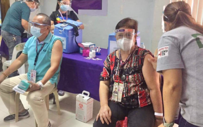 <p><strong>VACCINATION.</strong> Senior citizen personnel of the Misamis Oriental Capitol get the Covid-19 jabs on Tuesday (May 11, 2021). The Provincial Health Office says at least 18,230 front-liners and senior citizens in the province have completed their two-dose vaccine shots since March. <em>(Photo courtesy of Misamis Oriental Provincial Information Office)</em></p>