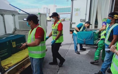 <p><strong>JABS ARE HERE</strong>. Some 4,760 vials, equivalent to 47,600 doses, of AstraZeneca Covid-19 vaccines arrive at the Bacolod-Silay Airport from Manila on Tuesday (May 11, 2021). The province of Negros Occidental has an allocation of 3,080 while Bacolod City has received 1,680 vials.<em> (Photo courtesy of Provincial Incident Management Team-Negros Occidental)</em></p>