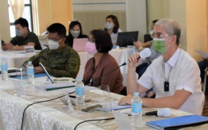 <p><strong>PEACE AND ORDER MEETING</strong>. Negros Occidental Governor Eugenio Jose Lacson (right) presides the Joint Provincial Peace and Order Council-Provincial Anti-Drug Abuse Council Meeting at the Social Hall of the Provincial Capitol in Bacolod City on Wednesday (May 12, 2021). The local peace engagement with the communist-terrorist group in Negros Island was among the initiatives discussed during the activity. <em>(Photo courtesy of PIO Negros Occidental)</em></p>