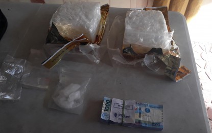 <p><strong>DRUG HAUL.</strong> More than two kilos of suspected shabu worth some P13 million were seized while two suspects were killed in a buy-bust operation in Barangay Sto. Cristo Sur, Gapan City, Nueva Ecija on Friday afternoon (May 14, 2021). Another suspect eluded arrest and is now the subject of a pursuit operation.<em> (Photo by Marilyn Galang)</em></p>