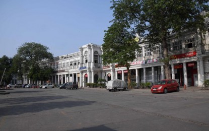 <p><strong>LOCKDOWN.</strong> Deserted roads and closed shops are seen during a Covid-19 lockdown at the Connaught Place in New Delhi, India, on Thursday (May 13, 2021). The country still has 3,704,893 active cases. <em>(Photo by Partha Sarkar/Xinhua)</em></p>