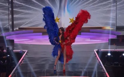 <p><strong>WORLD STAGE.</strong> Philippine representative Rabiya Mateo parades in her national costume during the Miss Universe national costume competition on May 13, 2021 (May 14, PH time) in Hollywood City, Florida. The coronation night will be held on Monday morning (May 17, PH time). <em>(Photo courtesy of Miss Universe)</em></p>