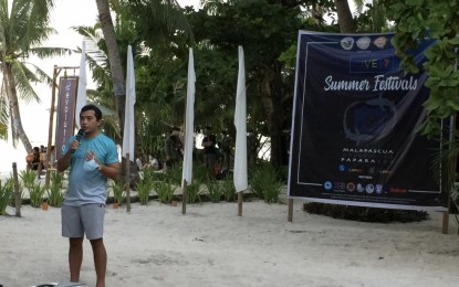 <p><strong>DIVING SPOT</strong>. Department of Tourism (DOT) 7 (Central Visayas) Director Shalimar Tamano speaks during the opening of the third leg of the DIVE7 Summer Festivals in Malapascua, a tourism island of Daanbantayan town in northern Cebu on Thursday (May 13, 2021). DIVE7 is a series of dive events being held in the region’s top dive destinations from April to June this year. <em>(PNA photo by Carlo Lorenciana)</em></p>