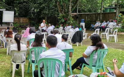 <p><strong>SERBISYONG 'DAR to DOOR.'</strong> North Cotabato Provincial Agrarian Reform Program Officer Rodolfo Alburo (standing) speaks to DAR-North Cotabato personnel in a recent gathering informing them of DAR Secretary John Castriciones’ directive to distribute all CLOAs to beneficiaries before May 2021 ends. The DAR-North Cotabato office is set to distribute 1,845 CLOAs to beneficiaries before the month-end. <em>(Photo courtesy of DAR-NoCot)</em></p>