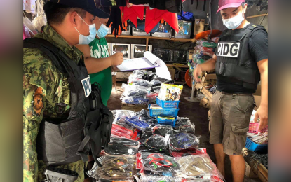 <p><strong>PIRATED ITEMS.</strong> Authorities arrest three persons and seize some PHP55,000 worth of pirated DVDs and CDs in an entrapment organized by the Criminal Investigation and Detection Group-Surigao del Norte on Monday (May 17, 2021) in Placer, Surigao del Norte. The local CIDG unit vows to intensify operations against counterfeit products in the area. <em>(Photo courtesy of CIDG-SDN)</em></p>