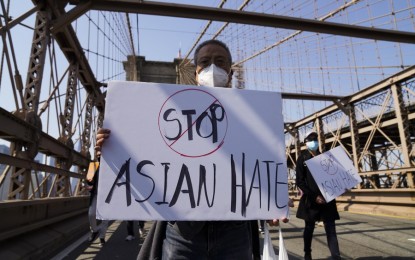 <p><strong>ANTI-ASIAN HATE CRIMES BILL.</strong> People march to protest against anti-Asian hate crimes on Brooklyn Bridge in New York, the United States on April 4, 2021. The US House on Tuesday (May 18) overwhelmingly voted to pass a bill aimed at combating the rise in anti-Asian hate crimes in the country, sending the legislation to President Joe Biden's desk for signature.<em> (Xinhua/Wang Ying)</em></p>