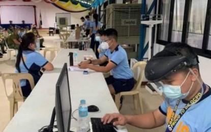<p><strong>READY TO ASSIST.</strong> Members of the PNP Medical Reserve Force (MRF) are deployed at a vaccination center in Quezon City on Wednesday (May 19, 2021). PNP chief, Gen. Guillermo Eleazar said MRF members are tasked to ensure the observance of minimum health protocols and prevent overcrowding in vaccination sites. <em>(Photo courtesy of PNP)</em></p>