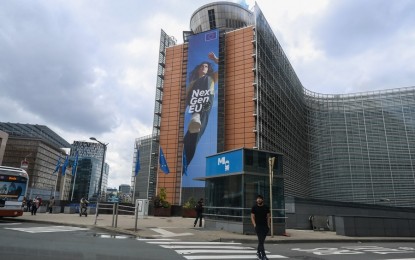 <p><strong>READY FOR TOURISTS.</strong> People walk near the headquarters of the European Commission in Brussels, Belgium on May 19, 2021. The European Union recommended opening its external borders to non-essential travel into the bloc if travelers have been fully vaccinated against Covid-19. <em>(Xinhua/Zheng Huansong)</em></p>