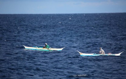 <p><strong>SUMMER DAY.</strong> Two Marinduque boatmen seem to be in a race in this undated photo. Marinduque, Quezon, Laguna, and Albay are among the identified provinces whose tourism sector recovery will be prioritized, the Tourism department announced on Friday (May 21, 2021). <em>(Photo courtesy of Marinduque Island Tourism Council Facebook)</em></p>