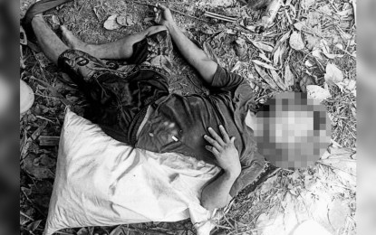 <p><strong>KILLED IN CLASH</strong>. A slain rebel who was left behind by his comrades after an armed skirmish between the communist terrorist group (CTG) and government troops in Sitio Castilla, Barangay Napolidan, Lupi, Camarines Sur on Wednesday (May 26, 2021). An M16 rifle and four anti-personnel mines were recovered from the encounter site<em>. (Photo courtesy of 9ID)</em></p>