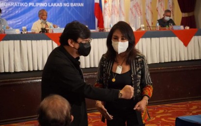 <p><strong>PDP-LABAN MEETING</strong>. Presidential Assistant for the Visayas Secretary Michael Lloyd Dino shares a light moment with Cebu Governor Gwendolyn Garcia at the sidelines of the National Council Meeting of the Partido Demokratiko Pilipino-Lakas ng Bayan (PDP-Laban) in Cebu City on Monday (May 31, 2021). Garcia, during the event, expressed her full support to the political party of President Rodrigo Duterte<em>. (Photo courtesy of OPAV)</em></p>