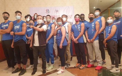 <p><strong>VAX FOR ATHLETES</strong>.  Philippine Olympic Committee (POC) president, Rep. Abraham “Bambol” Tolentino, and the members of the Gilas Pilipinas pool strike a pose after receiving the first dose of the vaccine on May 28, 2021. Tolentino on Monday (May 31) announces that the government has approved the inoculation of all athletes. <em>(Photo courtesy of POC)</em></p>