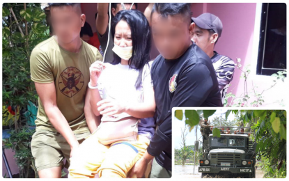 <p><span style="line-height: 1.5;"><strong>TROOPS TO THE RESCUE.</strong> Soldiers from the Army’s 7th Infantry Battalion (7IB) carry a sick woman whose house was inundated by floods in Isulan, Sultan Kudarat on Tuesday (June 1, 2021). The 7IB used its military trucks (inset) to bring to safety some 300 flood-affected families in the municipality. <em>(Photo courtesy of 7IB)</em></span></p>