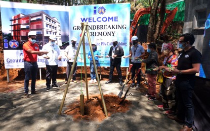 <p><strong>GROUNDBREAKING.</strong> Presidential Communications Operations Office Undersecretary and Philippine Information Agency Director General Ramon Cualoping III (left) leads the laying of the time capsule of the P26 million PIA-Cordillera regional office in Baguio City on Monday (May 31, 2021). It will be the first PIA building outside the National Capital Region and is one of the four buildings the agency will build this year. <em>(PNA photo by Redjie Melvic Cawis)</em></p>
