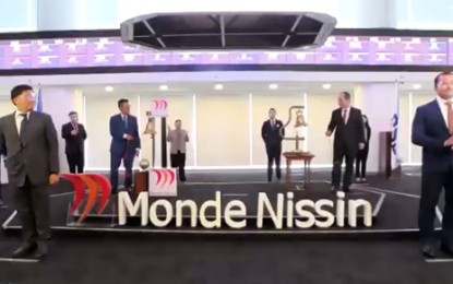 <p><strong>RECORD-BREAKING IPO.</strong> Monde Nissin completes its initial public offering (IPO) in the Philippine Stock Exchange (PSE) on Tuesday (June 1, 2021). Executives of Monde Nissin and PSE ring the bell to welcome the new listed firm in the stock market.<em> (Screenshot from Monde Nissin listing ceremony)</em></p>