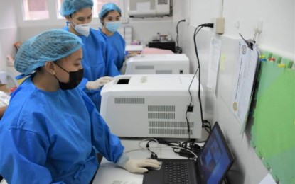 <p><strong>COVID-19 LAB</strong>. Medical technologists at work at the Teresita L. Jalandoni Provincial Hospital Molecular Laboratory in Silay City, Negros Occidental on Tuesday (June 1, 2021). Now a year old, the facility is the first local government unit-owned molecular laboratory in Western Visayas and also the first Covid-19 laboratory in Negros Island.<br /><em>(Photo courtesy of PIO Negros Occidental)</em></p>