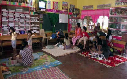 <p><strong>DISPLACED BY FLOOD</strong>. About 1,286 families or 4,813 individuals from the five barangays in Butuan City and 560 families from different towns in Agusan del Norte seek shelter in government schools and institutions on Tuesday afternoon (June 1, 2021) due to floods caused by Tropical Storm Dante. The city government provided them food aid and other necessities. (<em>Photo courtesy of Butuan City PIO</em>) </p>