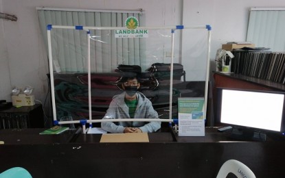 <p><strong>FINANCIAL INCLUSIVITY.</strong> Land Bank of the Philippines has a counter in Philippine Identification System registration sites nationwide, like in this undated photo in San Jose, Batangas. The applicant only has to show registration documents after completing the Step 2 (biometrics capture) process. <em>(Photo courtesy of PhilSys San Jose)</em></p>