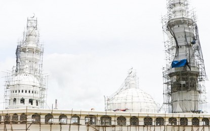 <p><strong>TAKING SHAPE.</strong> The Marawi Grand Mosque is under rehabilitation in this photo released Sunday (June 6, 2021) by Task Force Bangon Marawi. Housing Secretary Eduardo del Rosario said all ongoing infrastructure projects will be finished by December and rehabilitation works within the term of President Rodrigo Duterte. <em>(Photo courtesy of TFBM Facebook)</em></p>