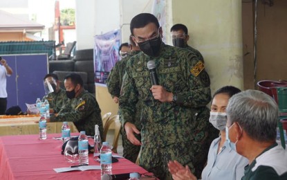 <p><strong>FORGING TIES</strong>. Philippine National Police chief Gen. Guillermo Eleazar in a dialogue with local government officials and residents in Palo, Leyte on Monday (June 7, 2021) during the first day of his two-day visit to Eastern Visayas. Eleazar reiterated his call to the public to send complaints to their hotlines to help them rid their organization of scalawags. (PNP photo)</p>