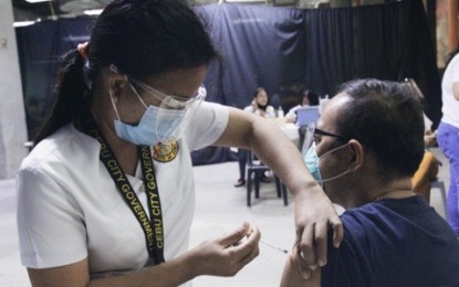 <p><strong>VAX ROLLOUT</strong>. Undated photo shows a nurse administering a vaccine jab to a resident of Cebu City. The Department of Health (DOH)-Region 7 on Wednesday (June 9, 2021) said a total of 245,503 individuals have already been inoculated against Covid-19 in Central Visayas. <em>(Photo courtesy of Cebu City Hall PIO)</em></p>