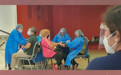 <p><strong>NOT FOR SALE</strong>. Barangay health workers check the blood pressure of newly vaccinated senior citizens in Cagayan de Oro City on June 8, 2021. On Thursday, the City Health Office assured the public that the vaccination for Covid-19 is free and does not allow the selling of vaccination slots. <em>(PNA file photo by Nef Luczon)</em></p>