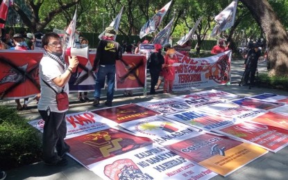 <p><strong>COME HOME, JOMA.</strong> Members of various anti-communist organizations stage a picket rally outside the Netherlands Embassy in Makati City on Thursday (June 10, 2021). They want the Dutch government to stop coddling Communist Party of the Philippines founding chair Jose Maria Sison and his colleagues. <em>(Contributed photo by Nolan Tiongco)</em></p>