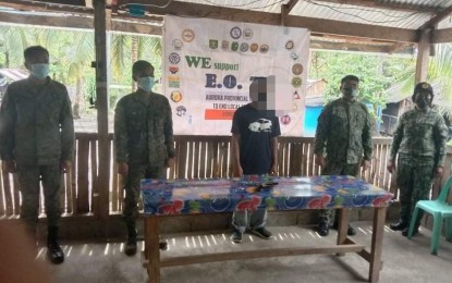 <p><strong>SURRENDERED</strong>. A former political guide of the Domingo Erlano Command of the New People’s Army (NPA) operating in the northern part of Aurora province voluntarily surrendered to government troops on Wednesday (June 9, 2021). The 41-year-old "Ka JM", a resident of Barangay Buhangin, Baler, Aurora likewise turned over his .22 caliber handgun with six ammunition. <em>(Photo courtesy of the 91IB, Philippine Army)</em></p>