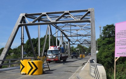 <p><strong>REOPENED</strong>. The Cabu Steel Bridge along Nueva Ecija-Aurora Road in Cabanatuan City, Nueva Ecija was reopened on Thursday (June 10, 2021) for light vehicles only. Motorcycles, tricycles, four-wheeled cars, buses and light loaded six-wheeler trucks are allowed to cross the bridge, but trailer trucks, double I-beam trucks and other large vehicles are prohibited. <em>(Photo courtesy of DPWH Region III)</em></p>