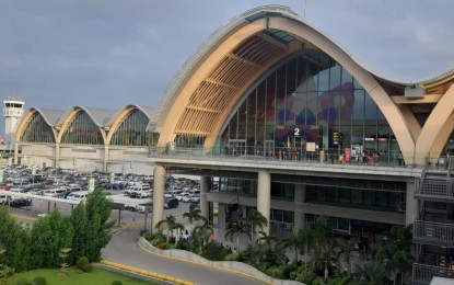 <p> </p>
<p><strong>FLIGHTS DIVERTED</strong>. Photo shows the facade of the Mactan-Cebu International Airport (MCIA) international arrival and departure terminals. MCIAA acting general manager Glenn Napuli on Thursday (June 10, 2021) said there are no changes in flight servicing at the airport, which is now focused on international cargo flights servicing following an order from Malacañang on June 5 to, for the second time, divert international flights to NAIA to ensure implementation of IATF rules on swabbing for OFWs and ROFs.<em> (PNA file photo by John Rey Saavedra)​</em></p>