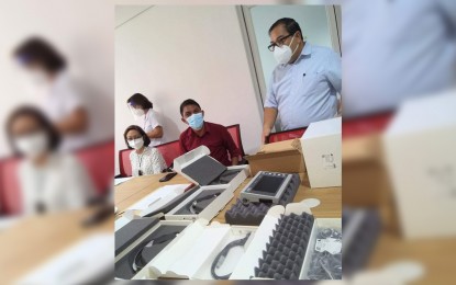 <p><span style="line-height: 1.5;"><strong>DONATIONS</strong>. Officials of mining firm Filminera Resources Corp. in Masbate City, are shown as they turn over two sets of video laryngoscope to the Masbate Provincial Hospital in an undated photo. The firm is expected to donate over 25,000 doses of the coronavirus disease 2019 (Covid-19) vaccines to inoculate workers of various local government units in the province<em>. (Photo courtesy of Filminera)</em></span></p>
