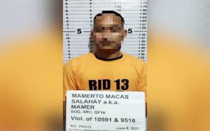 <p><strong>CHARGED</strong>. The Police Regional Office 13 (Caraga) has reported the filing of appropriate charges against Mamerto Salahay, alias Mamer, a member of the Special Operations Group, Sub-Regional Committee Guerilla Front 16 of the New People’s Army. Salahay was arrested in Butuan City on June 8, 2021, while transporting explosive paraphernalia, a gun, and ammunition.<em> (Photo courtesy of PRO-13 Information Office)</em></p>
