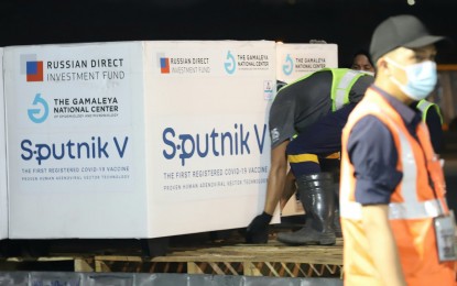 <p><strong>FRESH SUPPLIES.</strong> A shipment of 100,000 doses of government-procured Sputnik V vaccines lands at the Ninoy Aquino International Airport Terminal 3 in Pasay City on Friday night (June 11, 2021). The jabs were transported via Qatar Airways flight QR928.<em> (PNA photo by Robert Oswald Alfiler)</em></p>