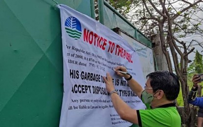 <p><strong>SHUTDOWN.</strong> The Department of Environment and Natural Resources stops the operation of an estimated four-hectare open dumpsite of the municipal government of Sta. Ana in Pampanga on Feb. 5, 2021. The Commission on Human Rights said on Tuesday (June 15) such moves show the country values human rights to a clean environment. <em>(Photo courtesy of DENR)</em></p>