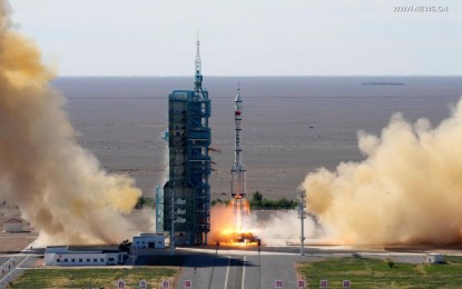 <p><strong>SPACECRAFT.</strong> The crewed spacecraft Shenzhou-12, atop a Long March-2F carrier rocket, is launched from the Jiuquan Satellite Launch Center in northwest China's Gobi Desert on June 17, 2021. It is China's seventh crewed mission to space and the first during the construction of China's space station. <em>(Xinhua/Li Gang)</em></p>