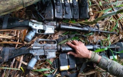 <p><strong>SEIZED.</strong> Troops of the Army's 58th Infantry Battalion seize firearms after two New People’s Army rebels surrendered in Salay, Misamis Oriental on Monday (June 14, 2021). The Army said the rebels are under pressure by the government to surrender. <em>(Photo courtesy of 58IB)</em></p>