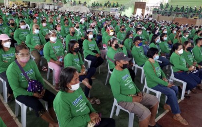 <p><strong>CASH FOR WORK</strong>. An undated photo shows the livelihood aid recipients under the Tulong Panghanapbuhay sa Ating Disadvantaged /Displaced Workers program of the Department of Labor and Employment in Cebu. Labor Secretary Silvestre Bello III handed over on the second week of June the total assistance amount of PHP15 million to beneficiaries in the towns of Medellin, Sta. Fe, Madridejos, and Bantayan. <em>(Photo courtesy of DOLE-7)</em></p>