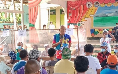 <p><strong>SUPPORT TO AFFECTED DRIVERS.</strong> Surigao del Sur Governor Alexander Pimentel (standing) led the distribution of food packs to 2,610 tricycle and pedicab drivers in Bislig City from June 19 to 20, 2021. The implementation of modified enhanced community quarantine in the whole Surigao del Sur since June 15 has affected the source of income of the drivers. <em>(Photo courtesy of Bislig City CIO)</em></p>