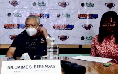 <p><strong>MOBILE VAX TEAMS</strong>. Screenshot shows DOH-7 regional director Dr. Jaime Bernadas answering media queries during a press briefing on Tuesday (June 22, 2021). Bernadas urged LGUs to form mobile vaccination teams to serve senior citizens right at their doorstep as well as those master listed but cannot go to the sites.<em> (Screenshot from DOH-7 live video)</em></p>